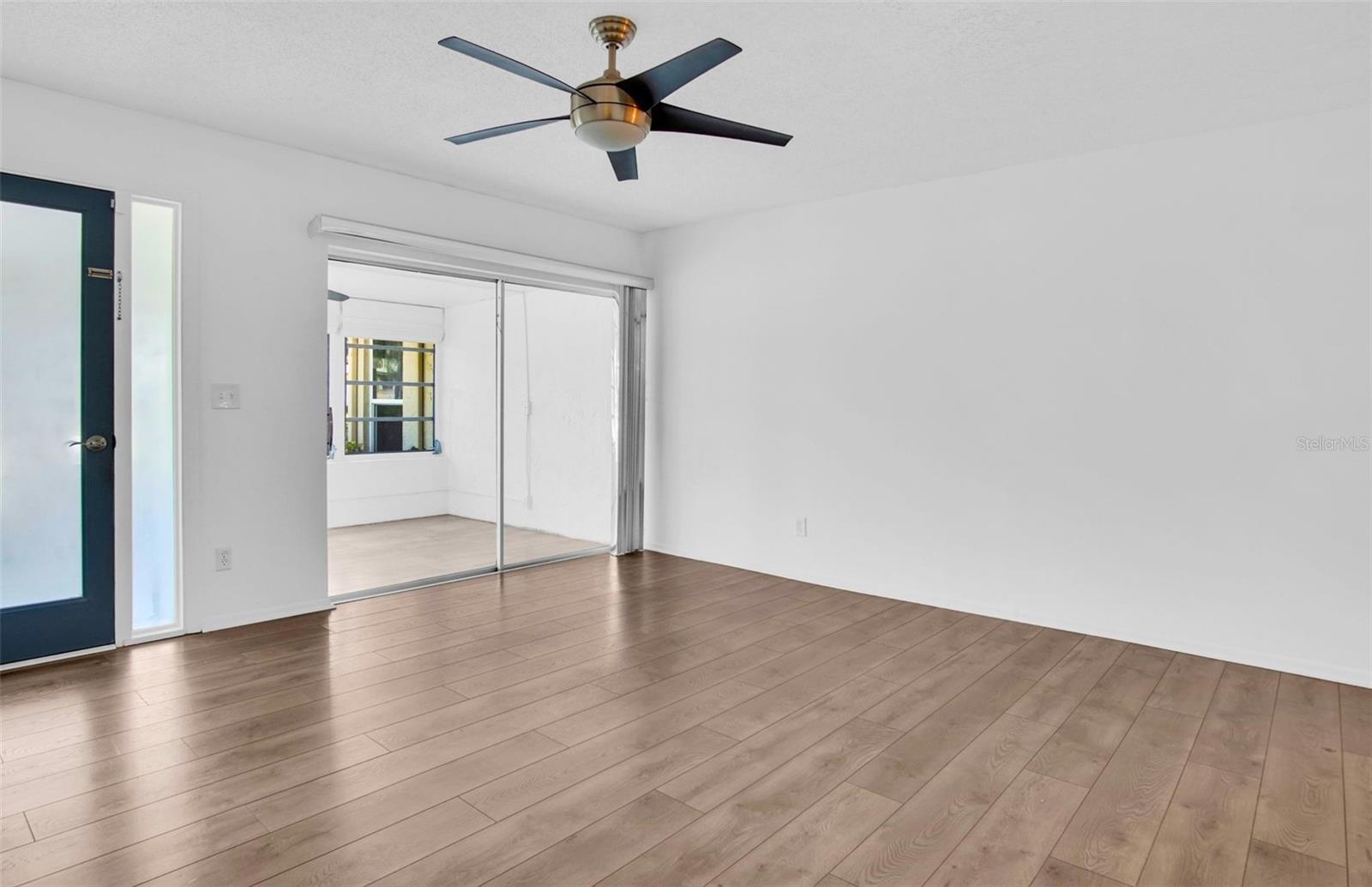Enter into this open floor plan completely modernized with new fans and luxury vinyl tile throughout the entire house ~