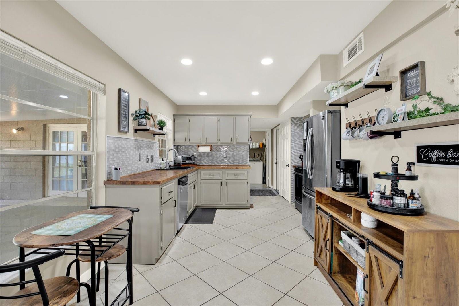 A kitchen an dining space designed for gathering, laughter, and every day moments!