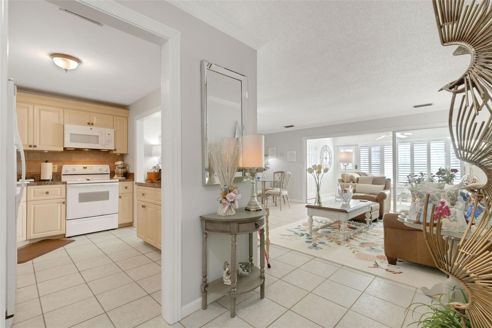 Entryway Looking to Kitchen, Living Room and Florida Room