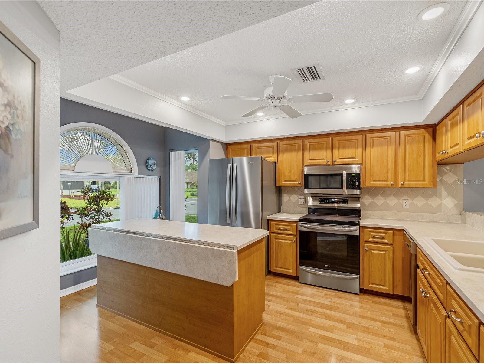 75 inch Island with xtra cabinet space and folder down leaf