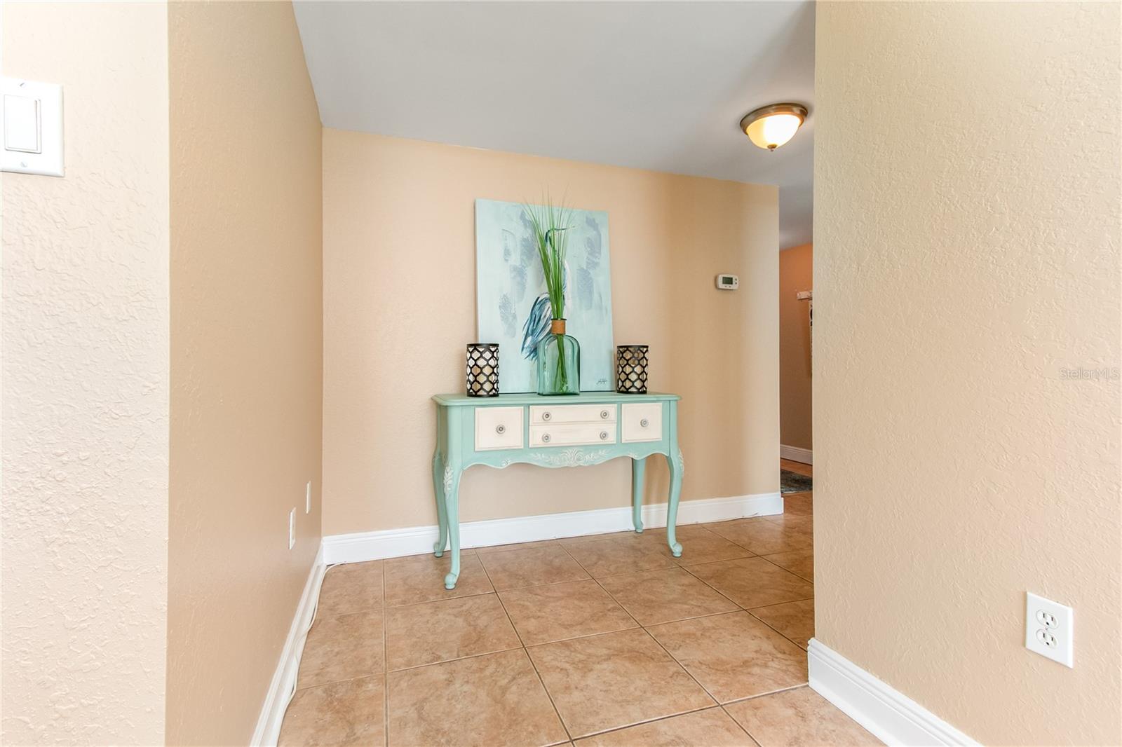 Corner condo with Foyer and extra closet space