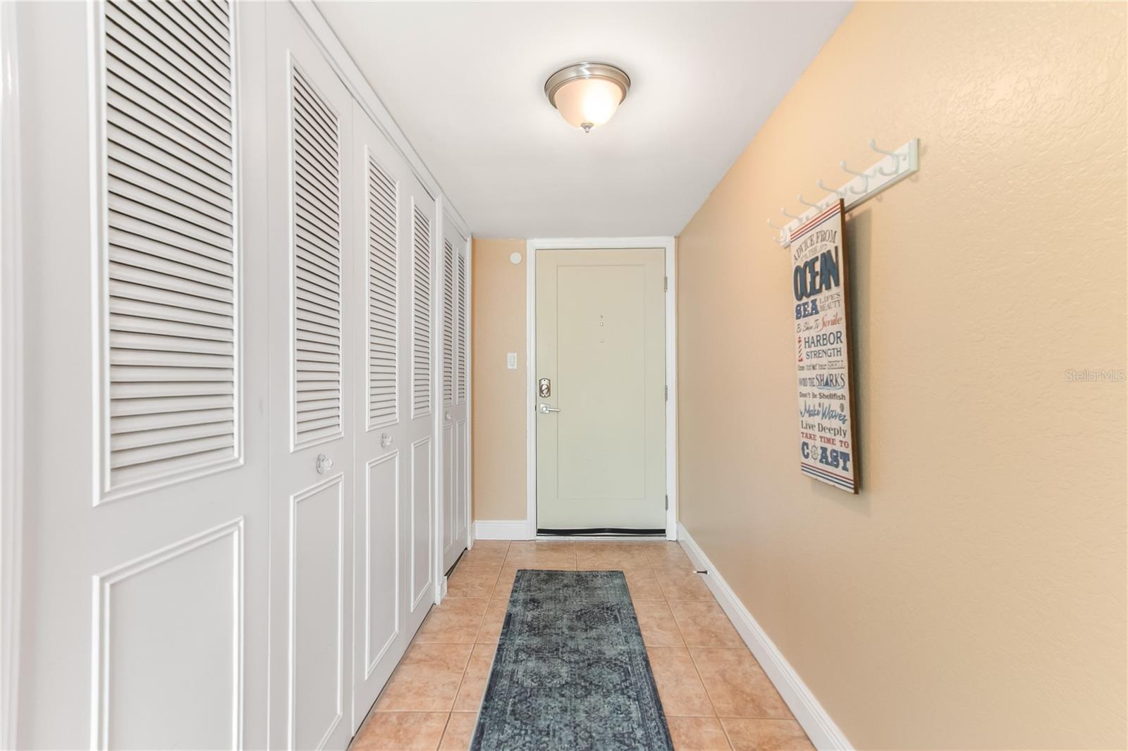 Foyer entrance with plenty of closet space