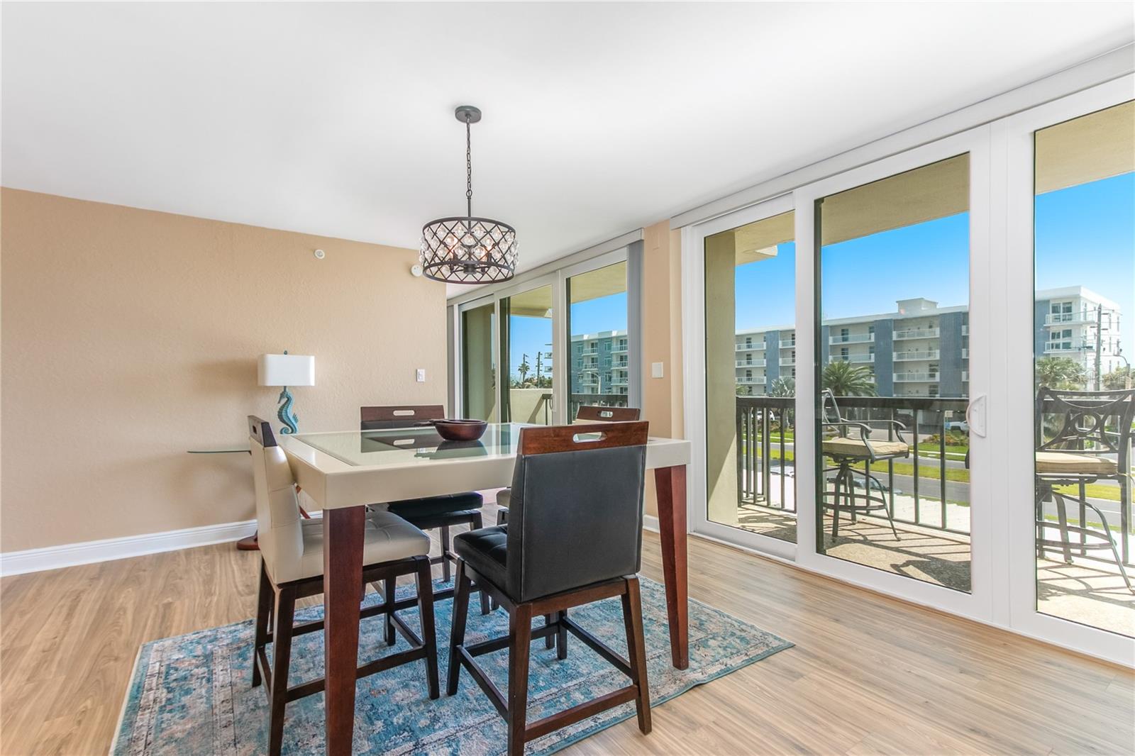 Dining room that leads to large balcony