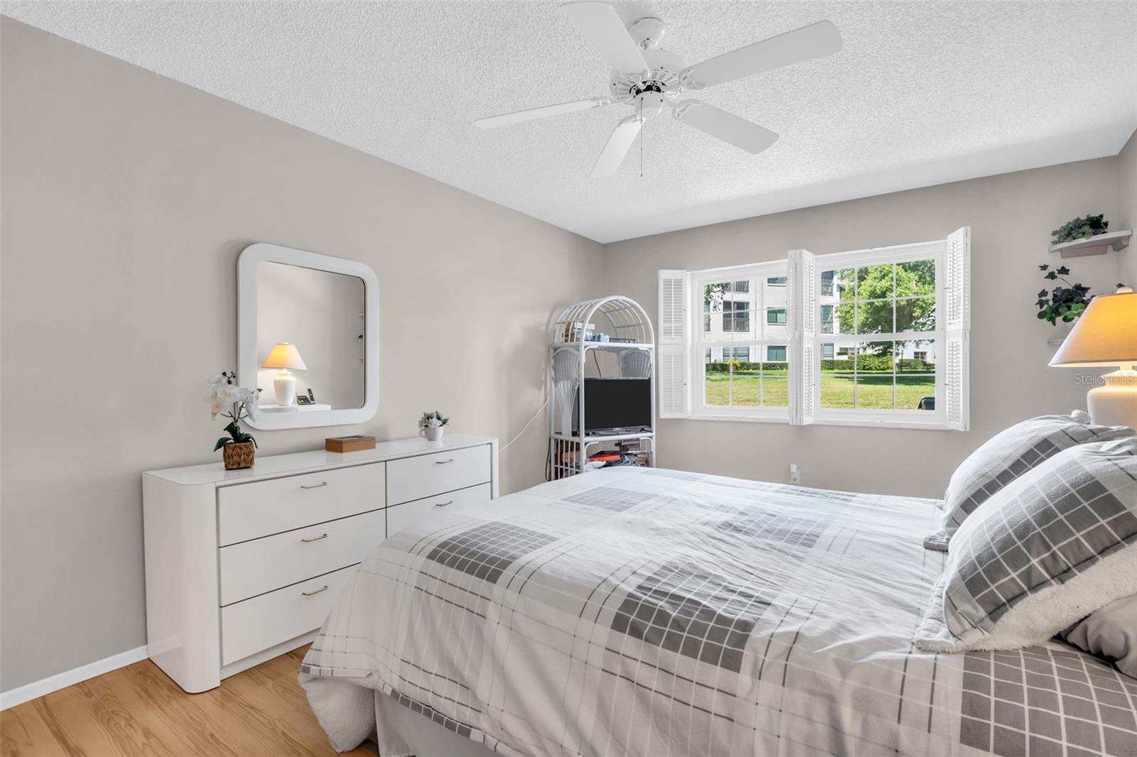 White wood shutters in both bedrooms ~