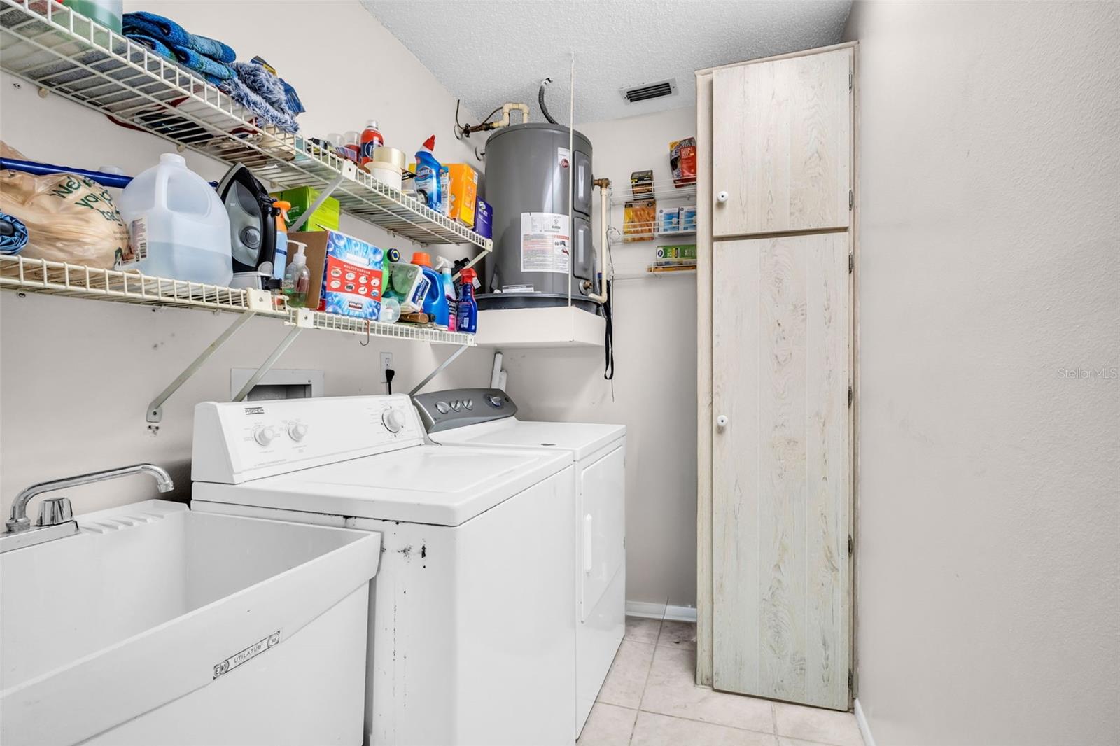 Inside laundry - storage cabinet ~