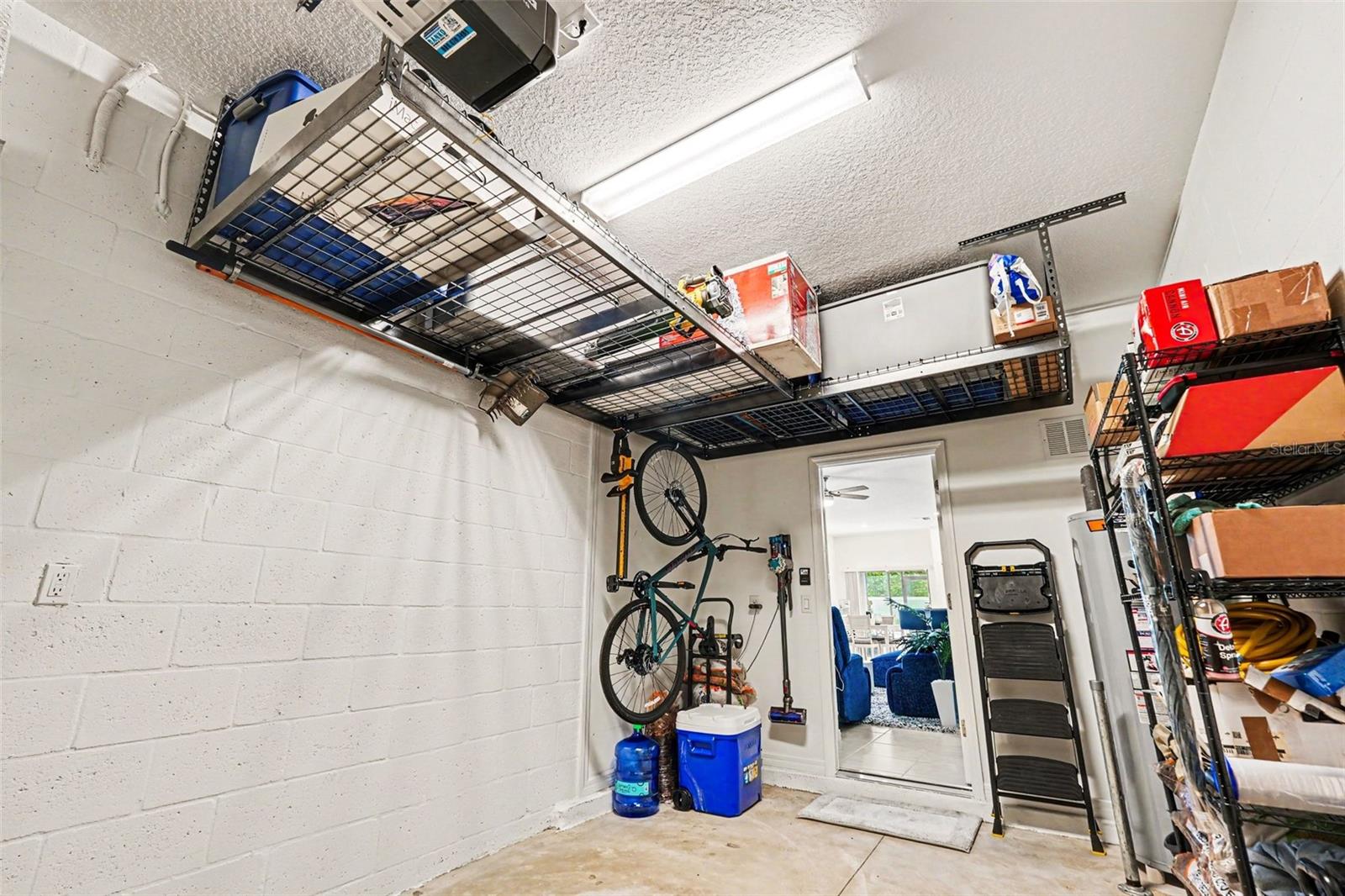 Garage-Overhead-Storage-Racks-Epoxy-Floor-Bike-Storage-Holiday-FL-Townhome