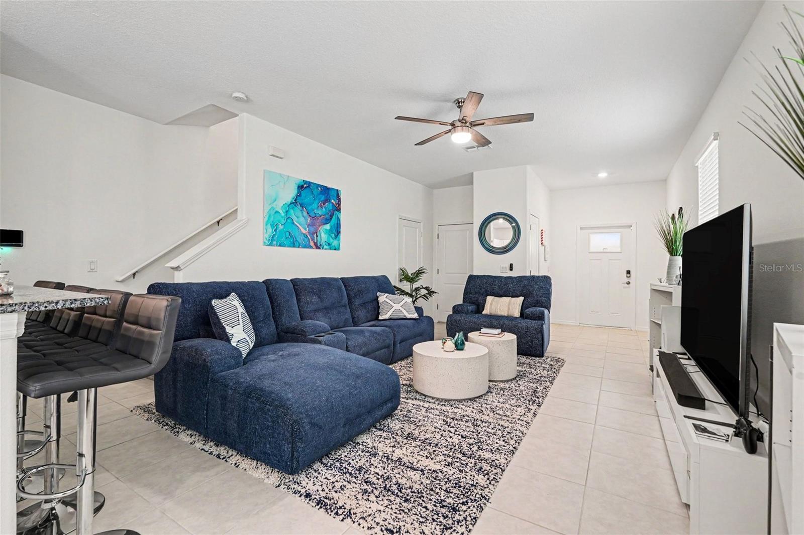 Bright-Open-Concept-Living-Room-Tile-Floors-Townhome-Holiday-FL-34690