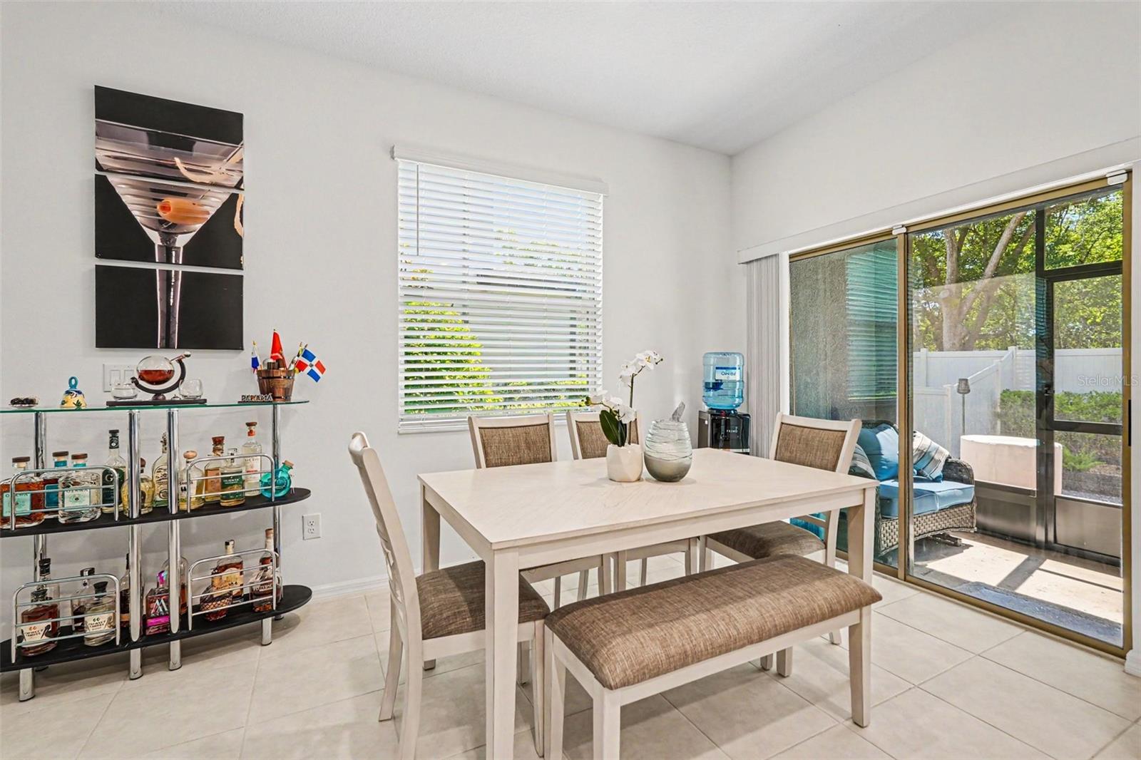 Dining-Area-Natural-Light-Slider-to-Screened-Lanai-Holiday-FL-Townhome