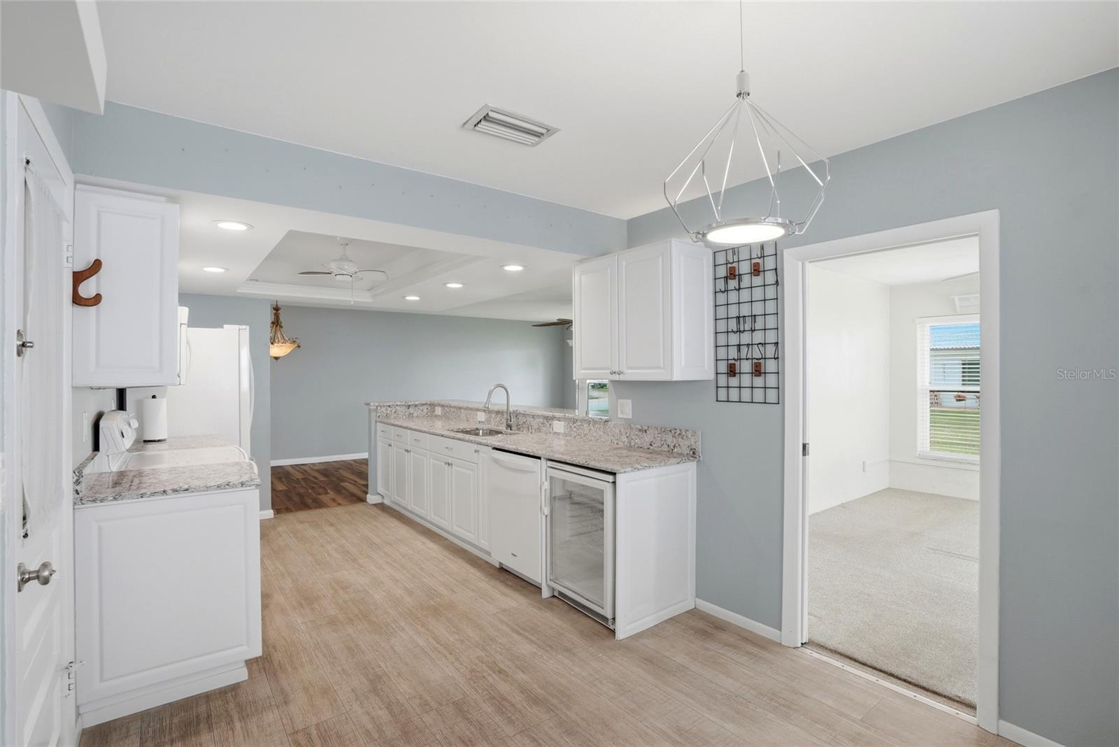 Elegantly updated kitchen with a wine fridge!