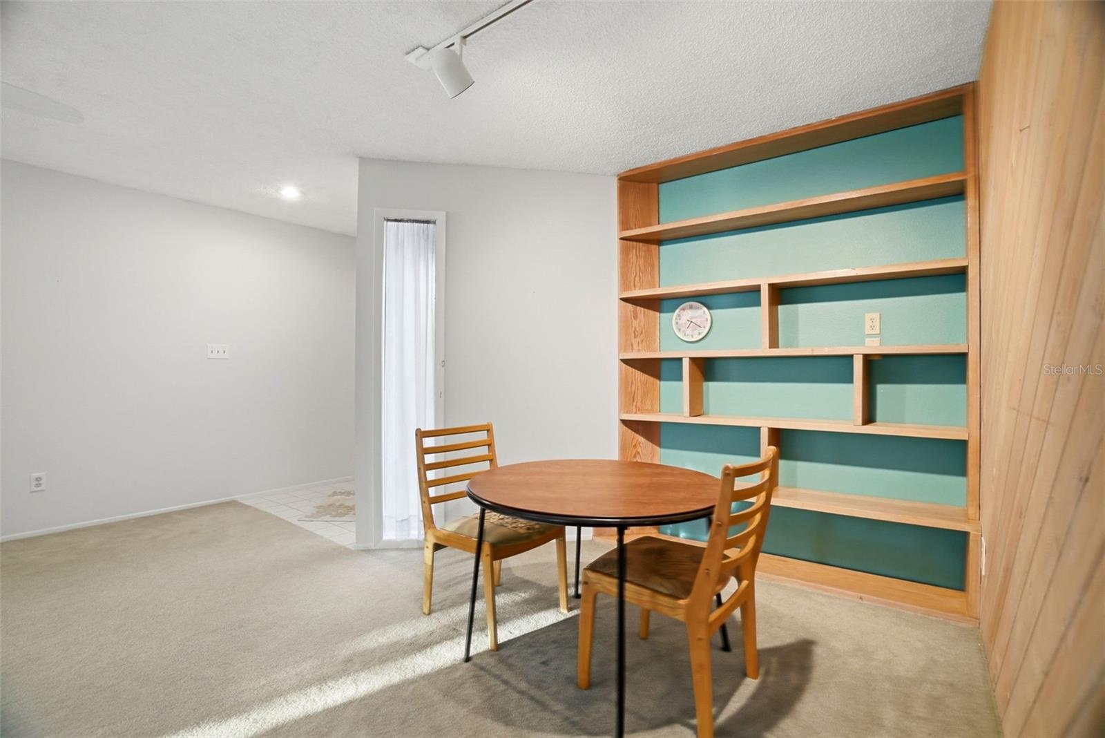 Built in shelving in the dining area of the Great Room.