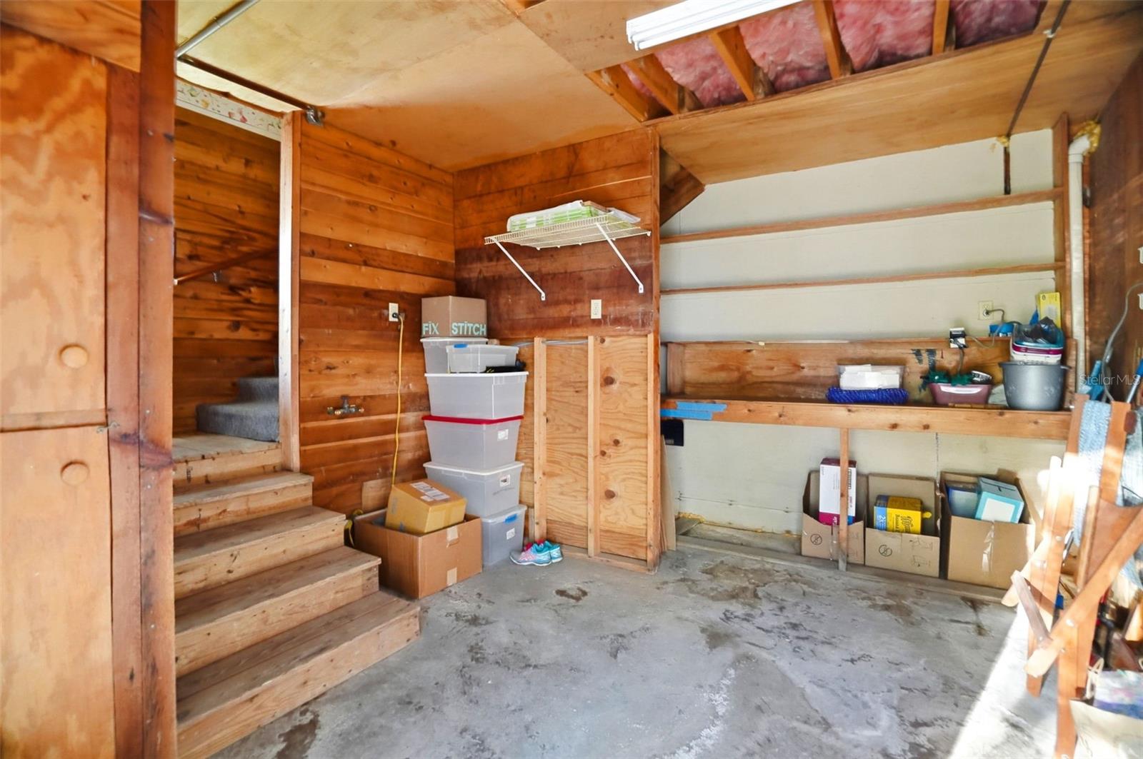 This utility room is access to the home from the carport.