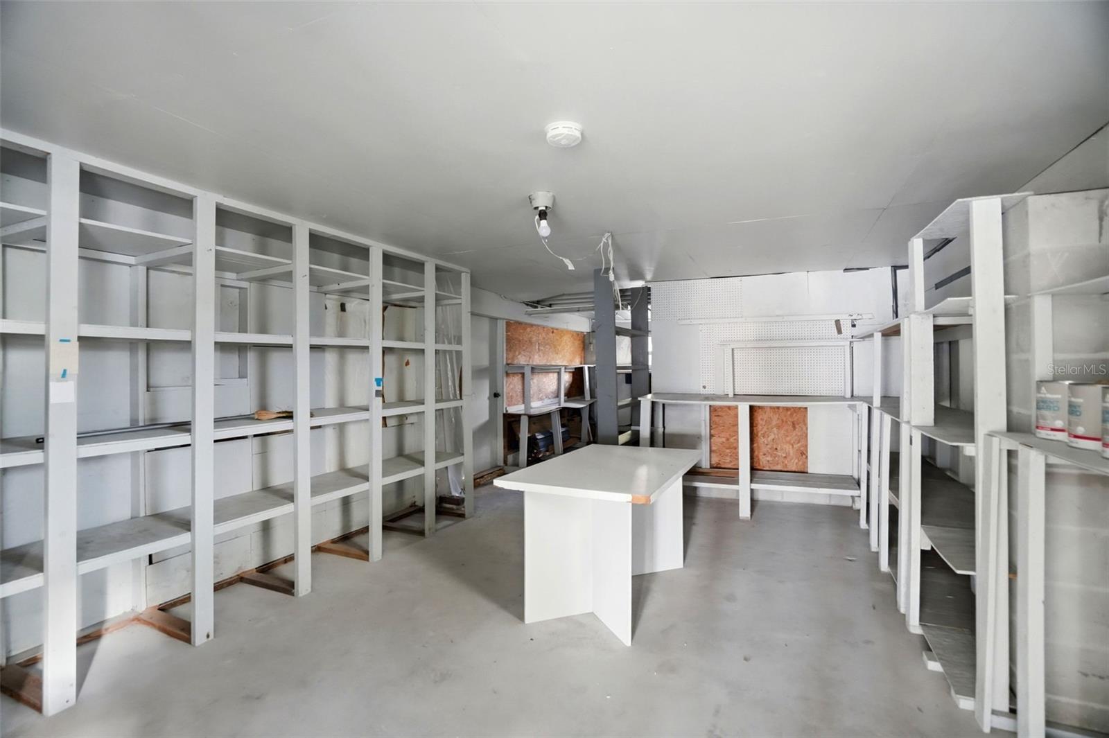 Large storage room/workshop under the home.