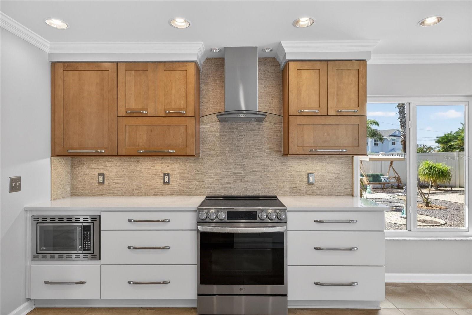 Wow kitchen! All new cabinets, counters and appliances, and so light and bright!