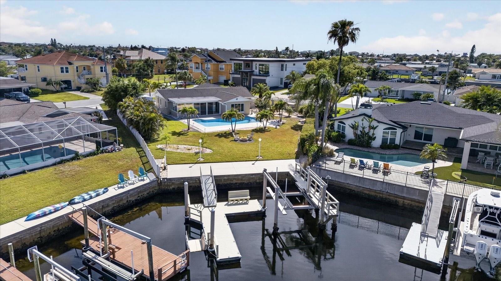 Floating dock, kayak dock and 10,00 lb boatlift on 50 ft of water
