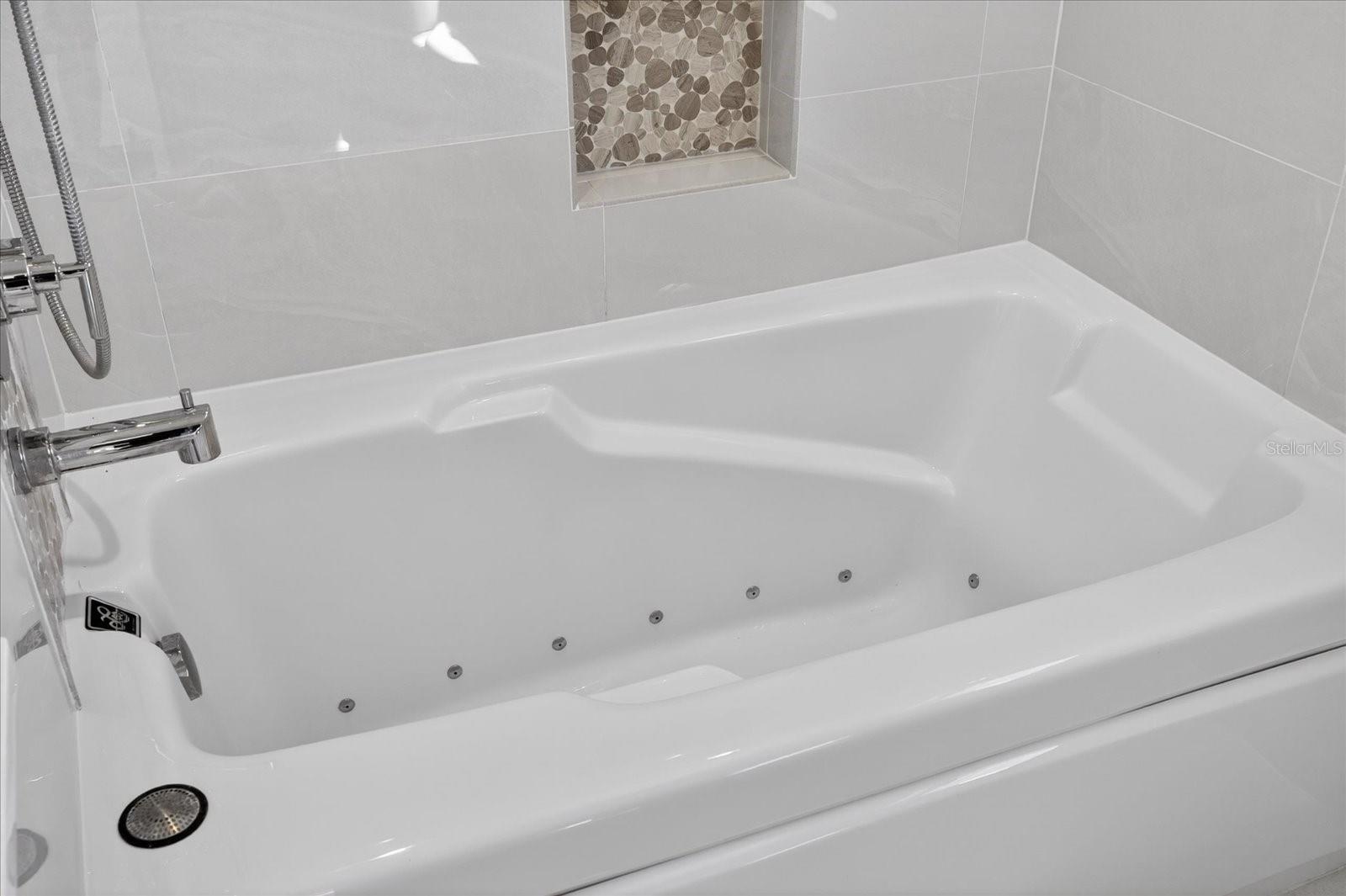 Main Bathroom features jetted tub