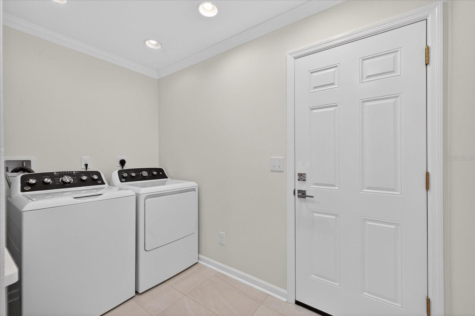 Interior Laundry Room - the newer washer and dryer convey!