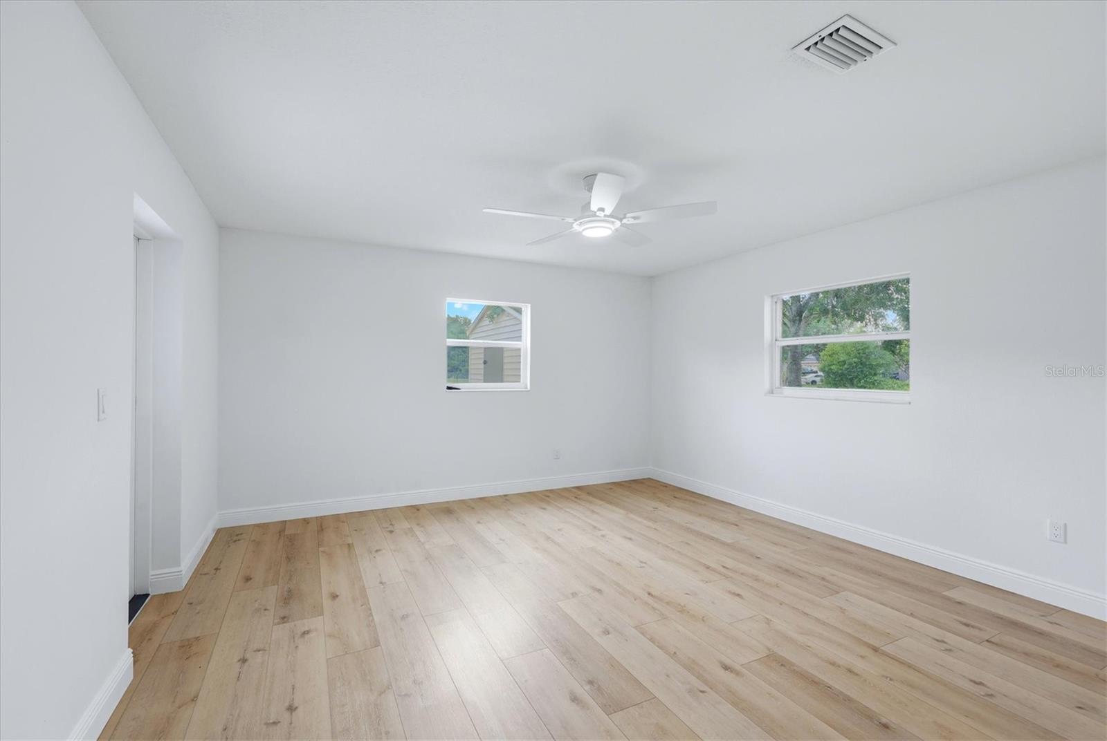 Primary bonus room/flex space offers remote controlled ceiling fan programmable to bright light, night light etc.
