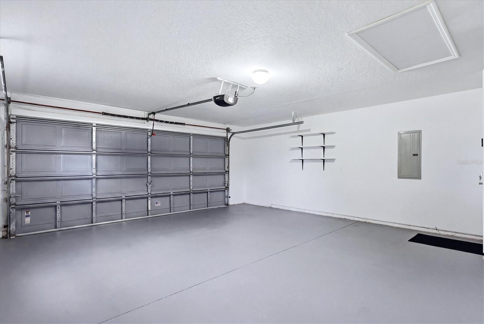 Spacious and clean 2 car garage with automatic door opener