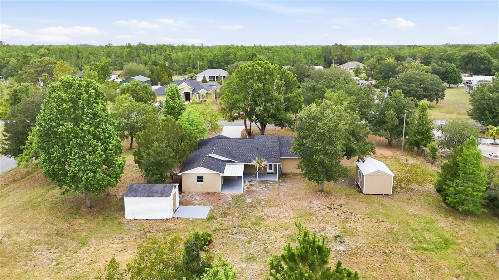 The huge backyard is a blank canvas waiting for your inspiration!