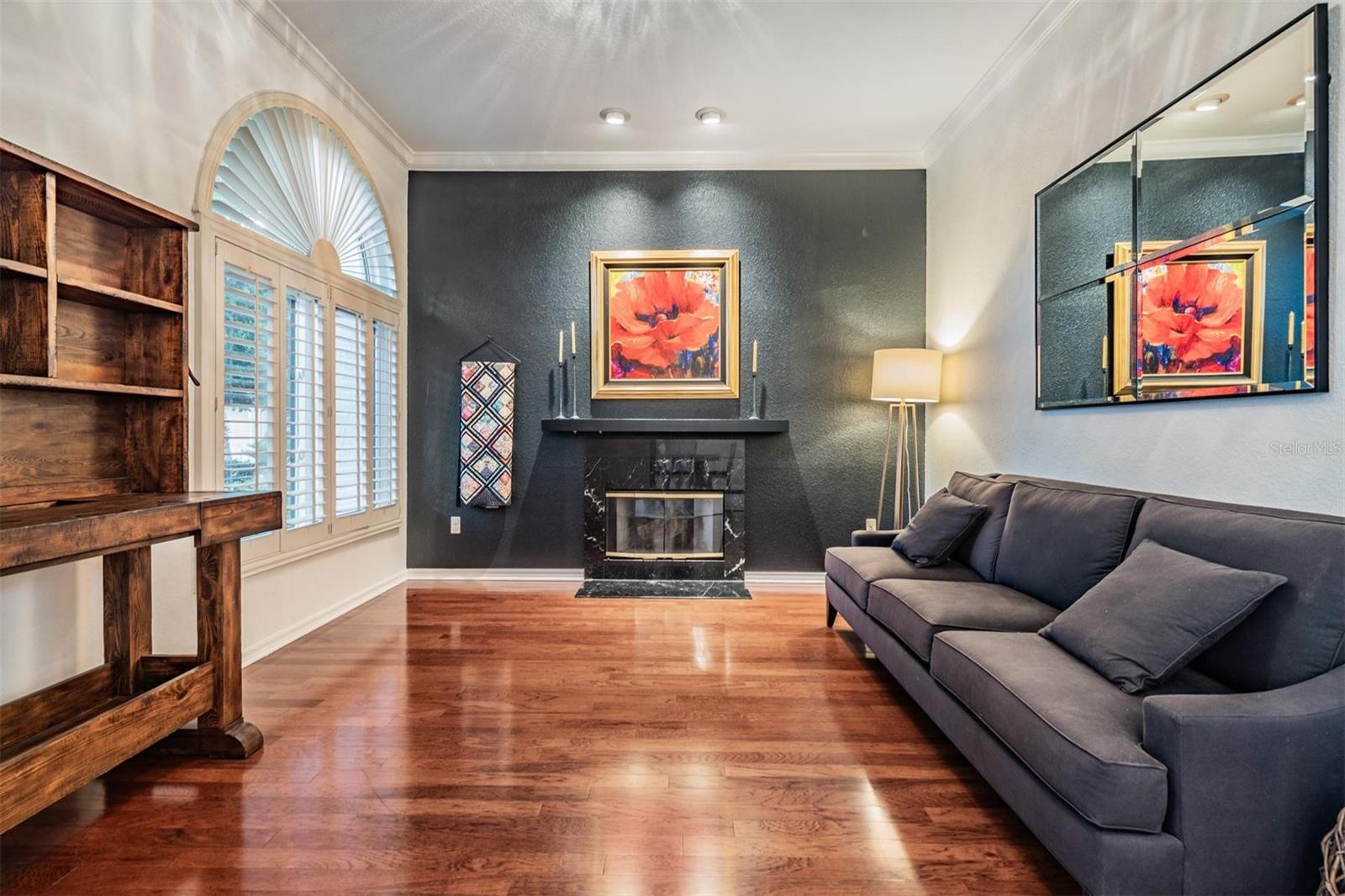 Living room with wood burning fireplace
