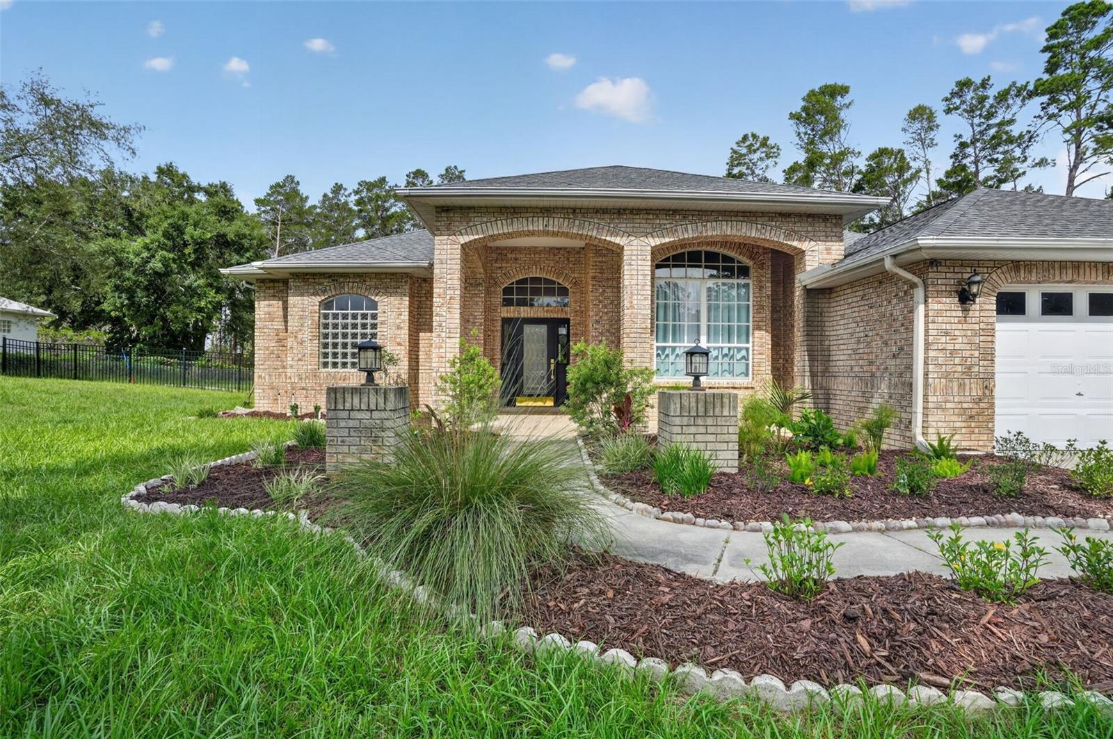 Front elevation with new landscaping
