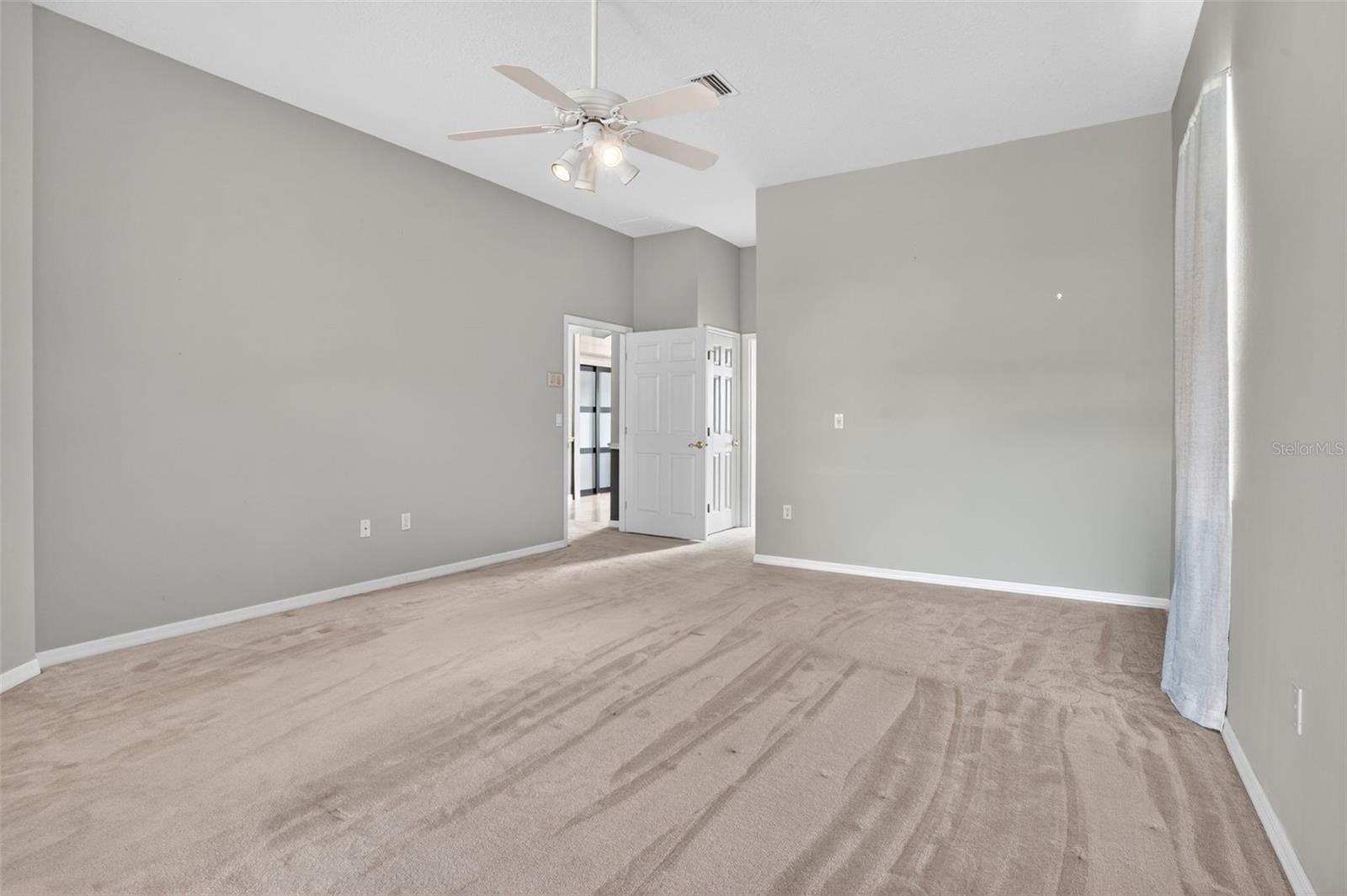 Master bedroom with french doors to the lanai