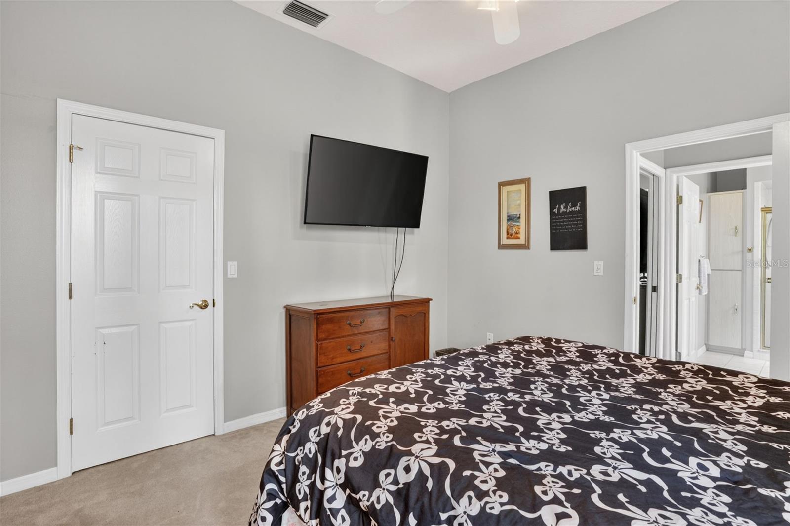In law suite bedroom with walk in closet and private entrance