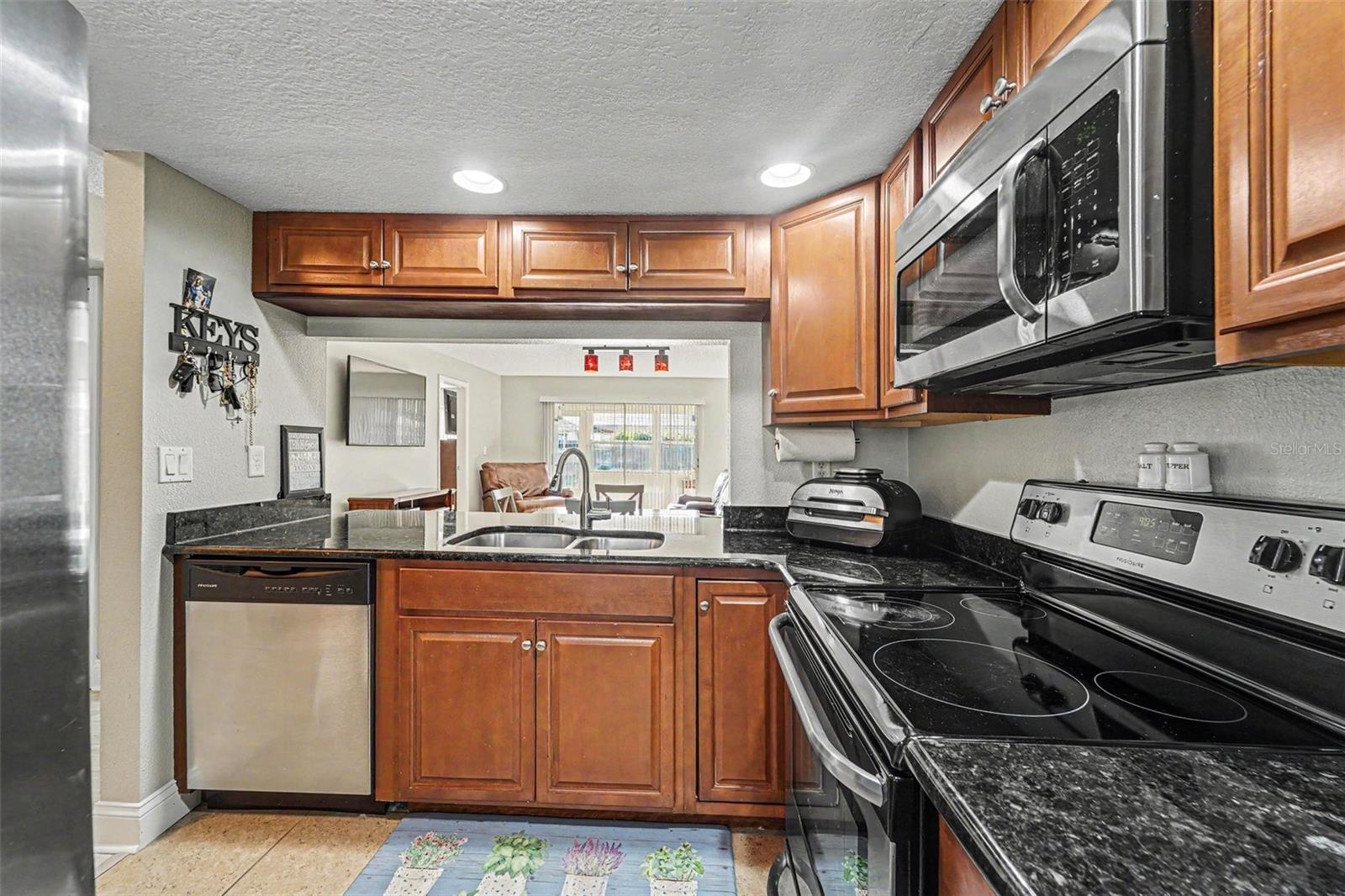 Upgraded Kitchen Cabinets, granite counters, and stainless steel applicances