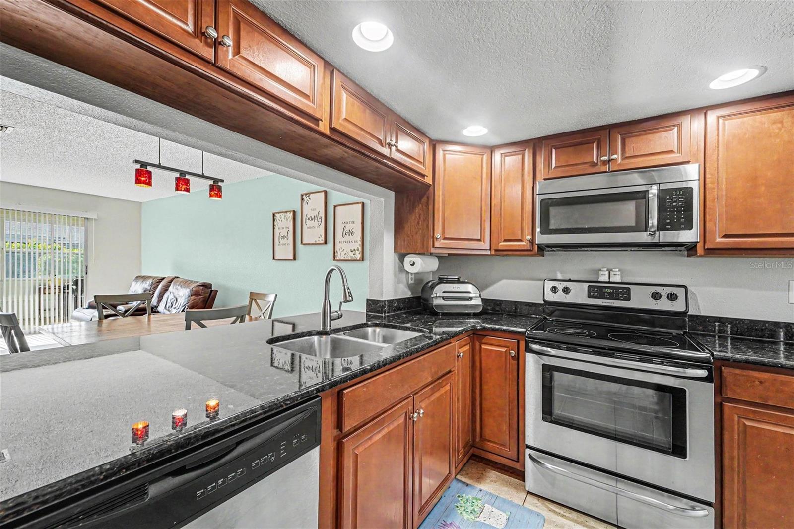 Kitchen with rich wood cabinets