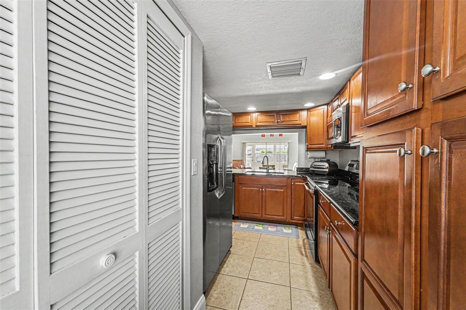 Washer & Dryer is behind these doors in the kitchen.