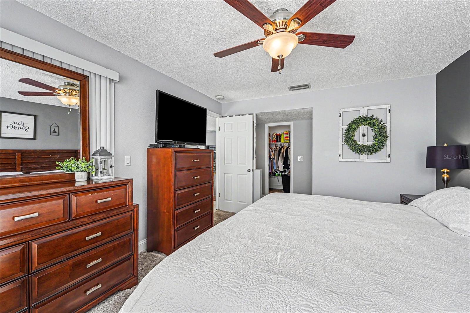 Primary bedroom showing area to walk in closet very spacious