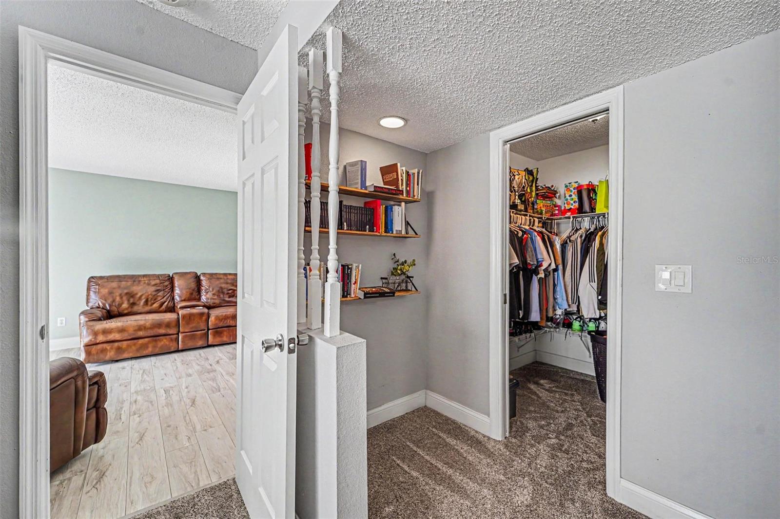 Primary Bedroom off the Living Room with walk in closet