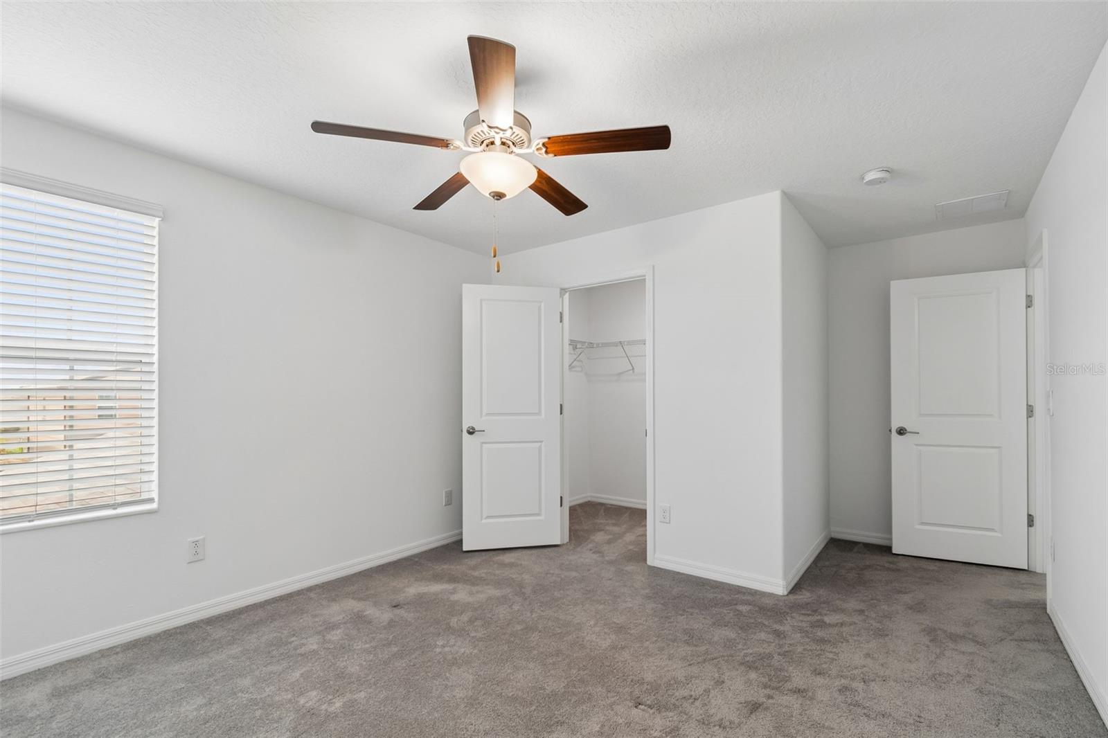 2nd bedroom with walk in closet