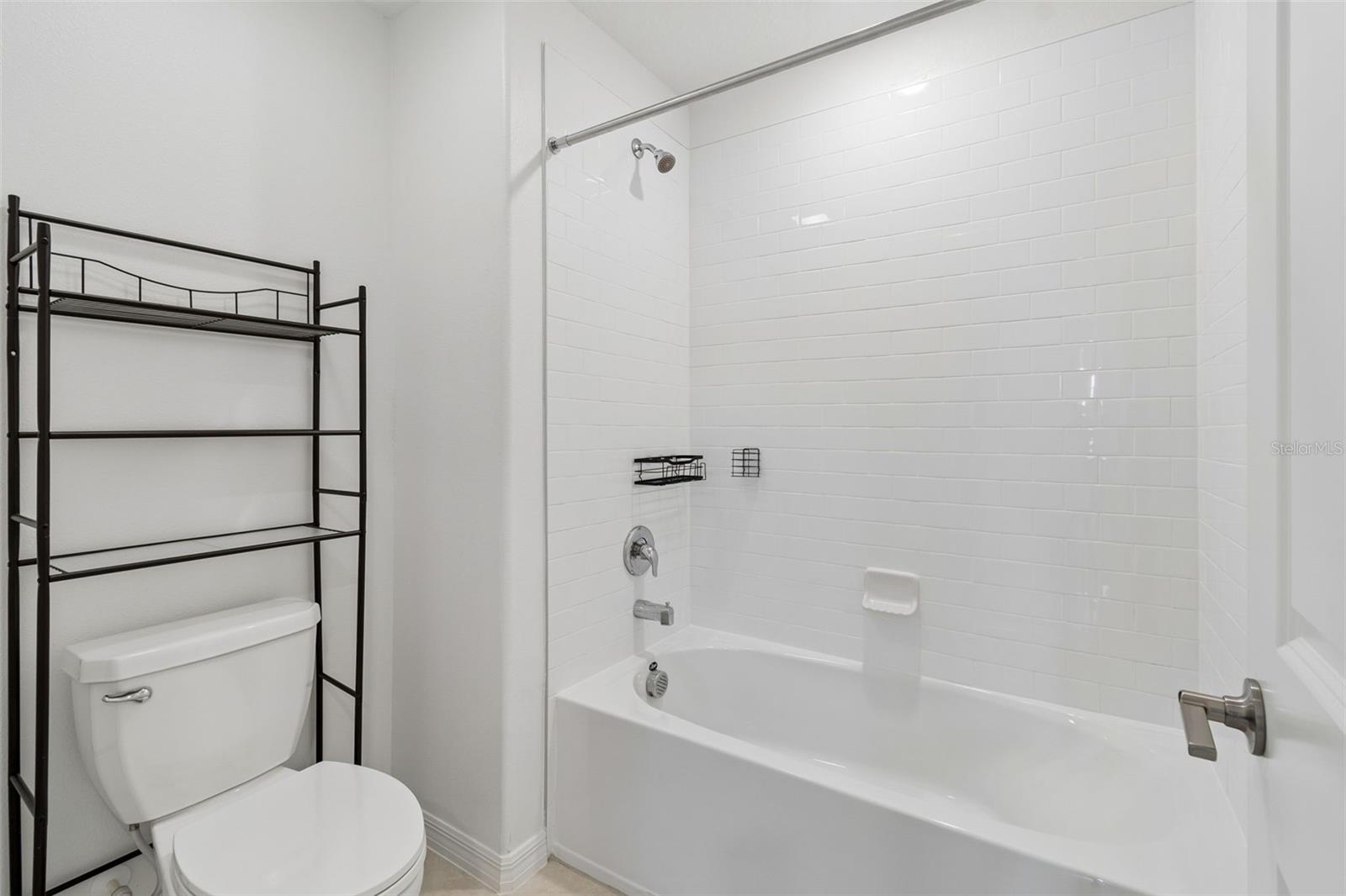 Full bathroom with tub