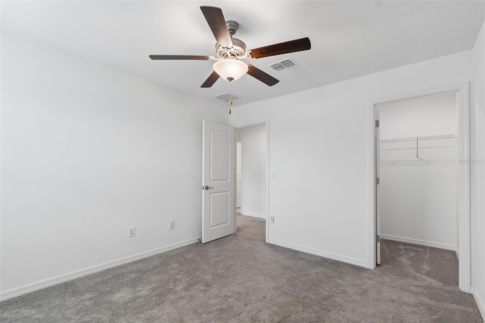 4th bedroom with walk in closet