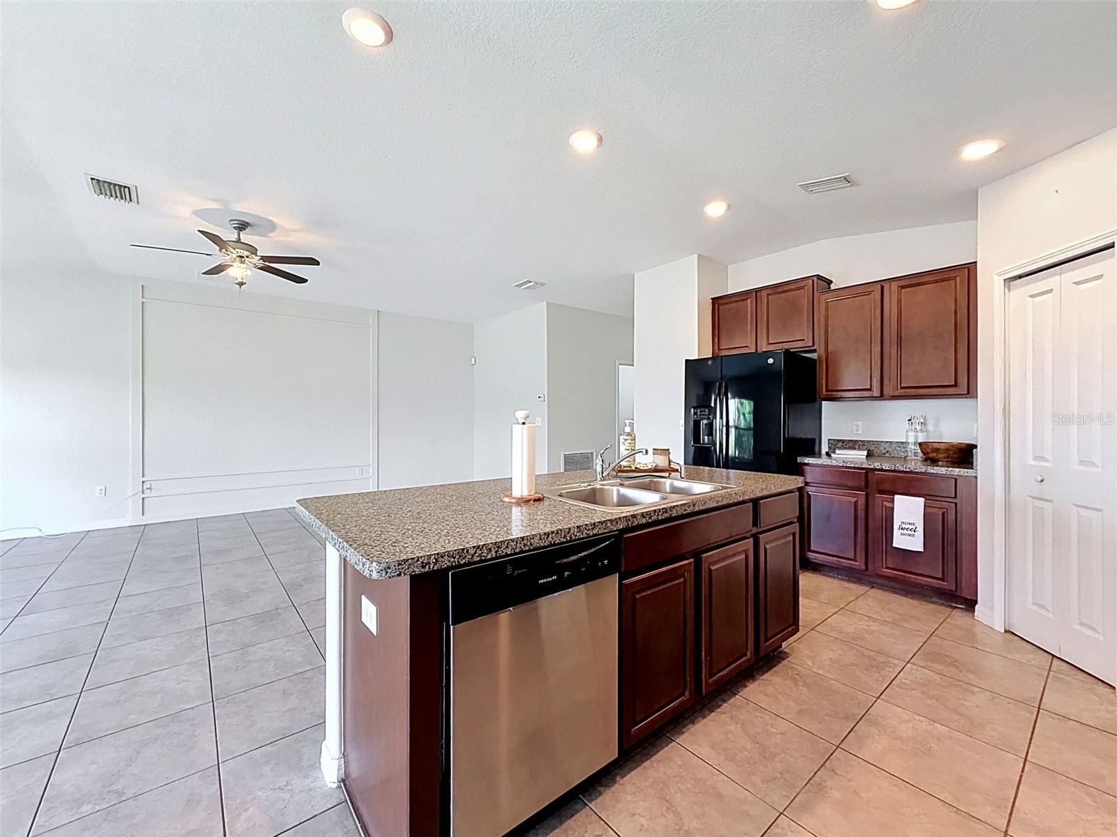 BIG, well-lit kitchen. Open to gathering spaces.