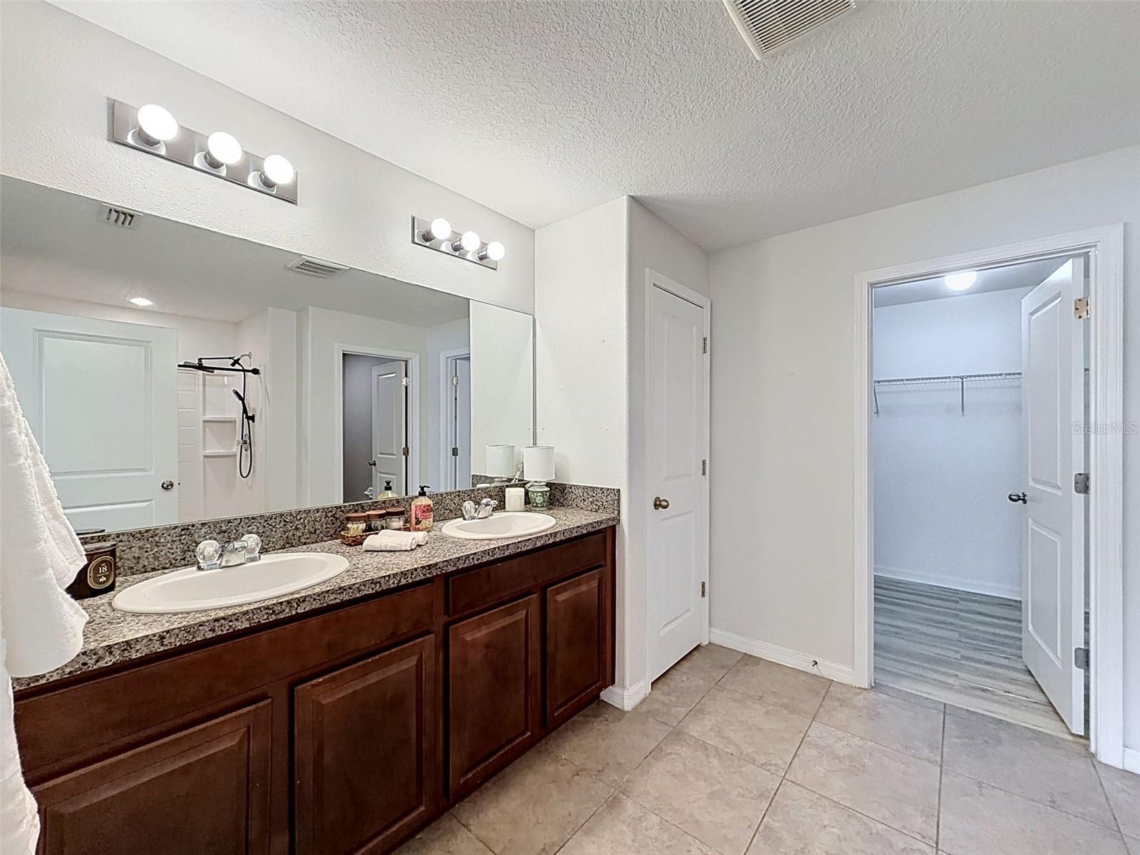Master bathroom with huge shower, WATER CLOSET for privacy, and LARGE walk-in closet.