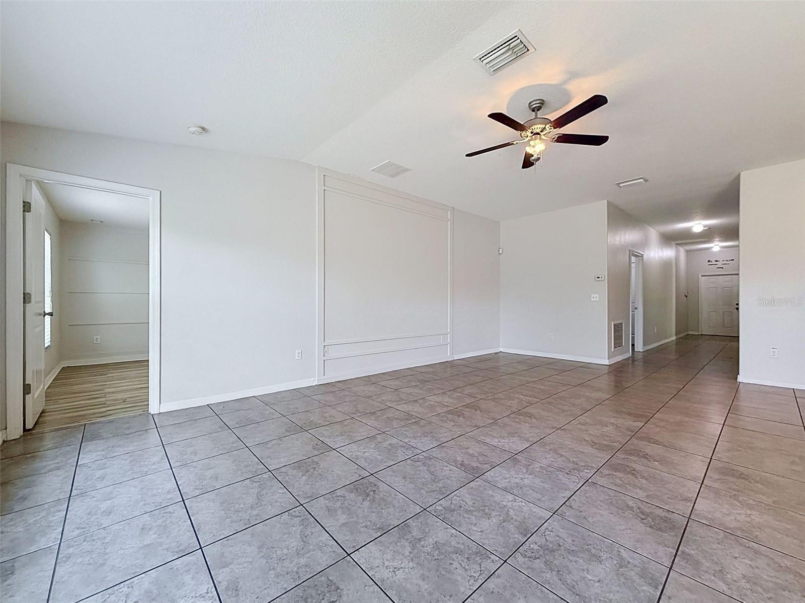 LARGE living room is the center of the home.
