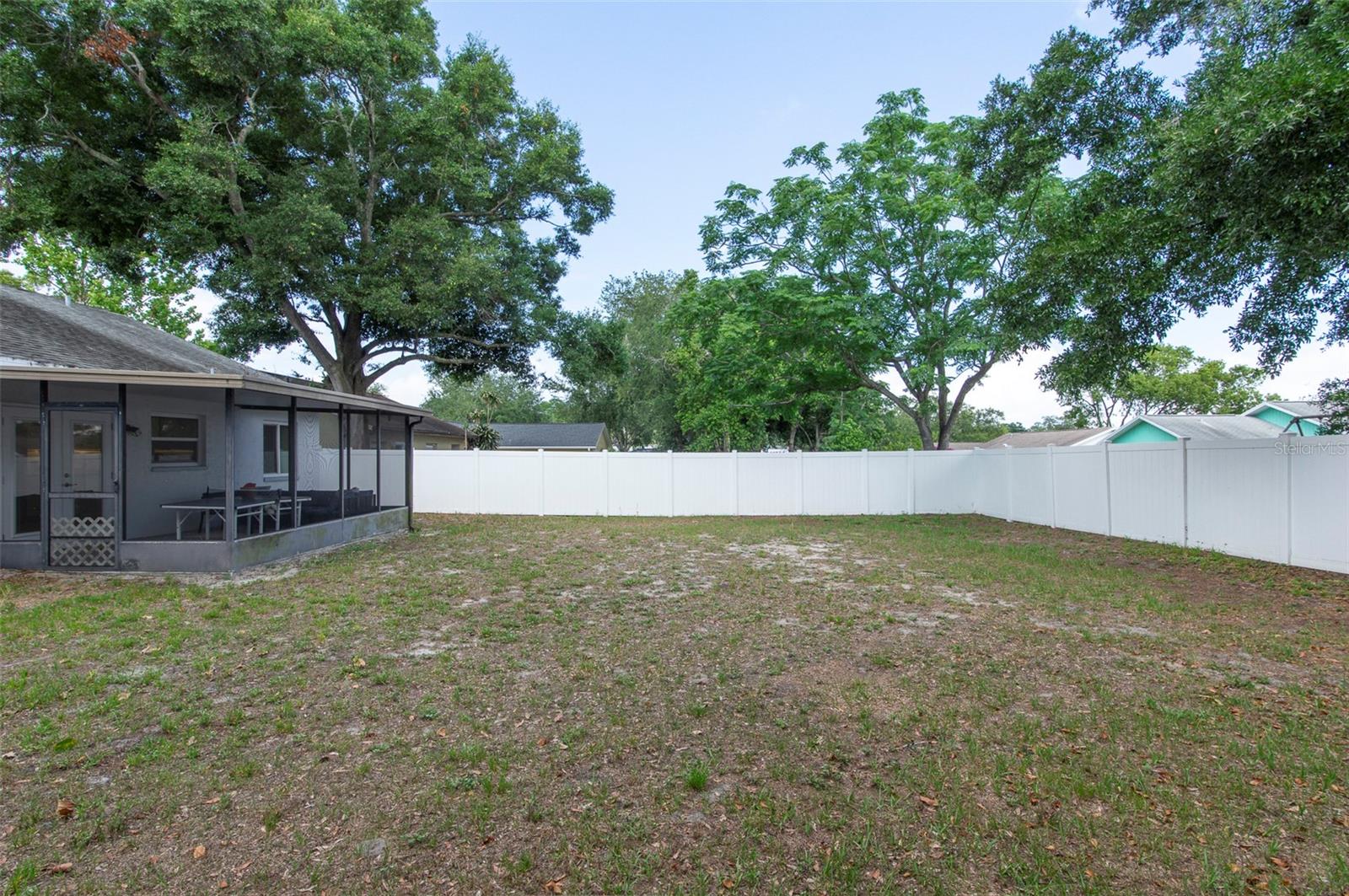 Expansive Fully Fenced Backyard from East side