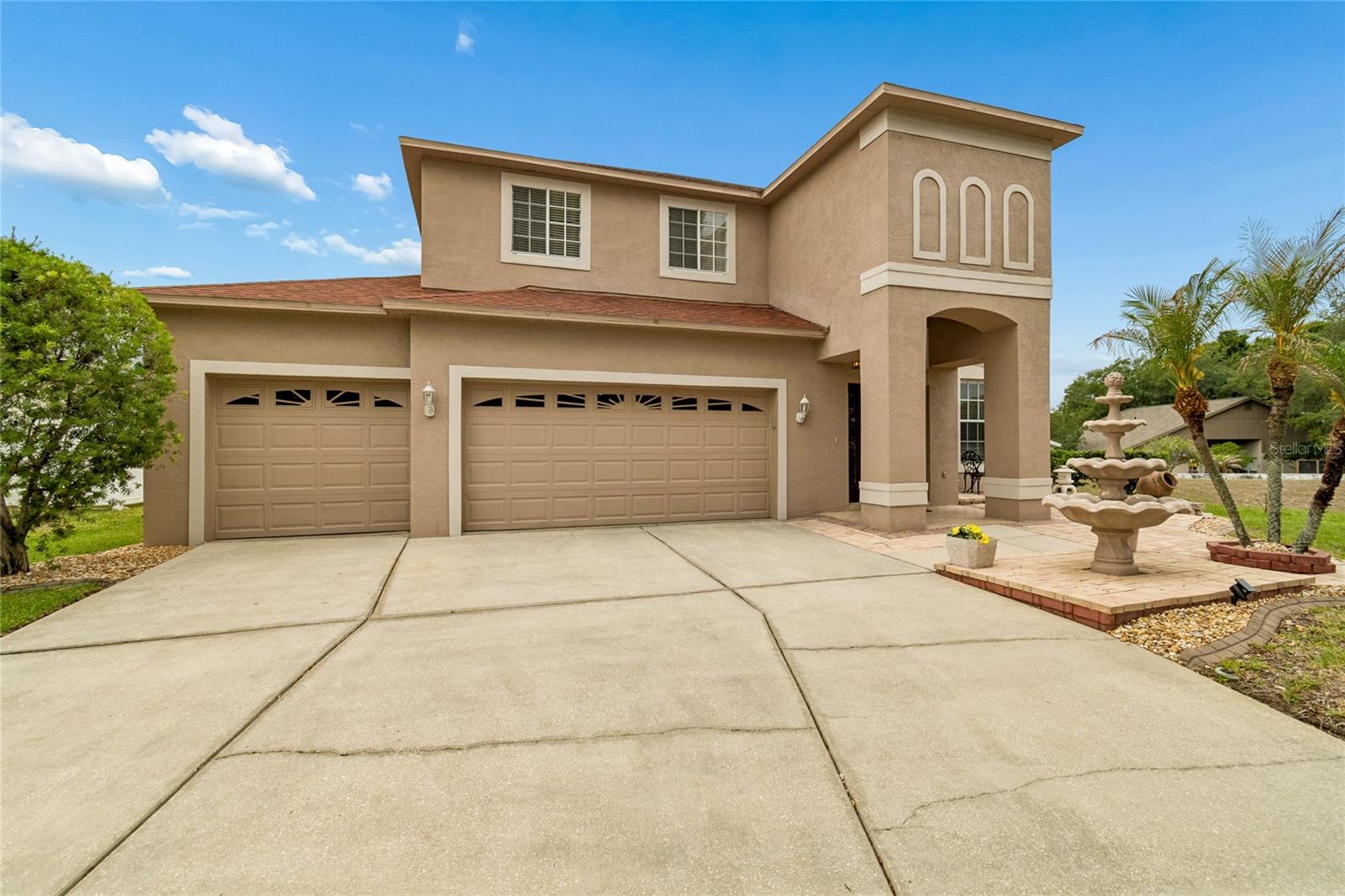 Front view of 3 car garage