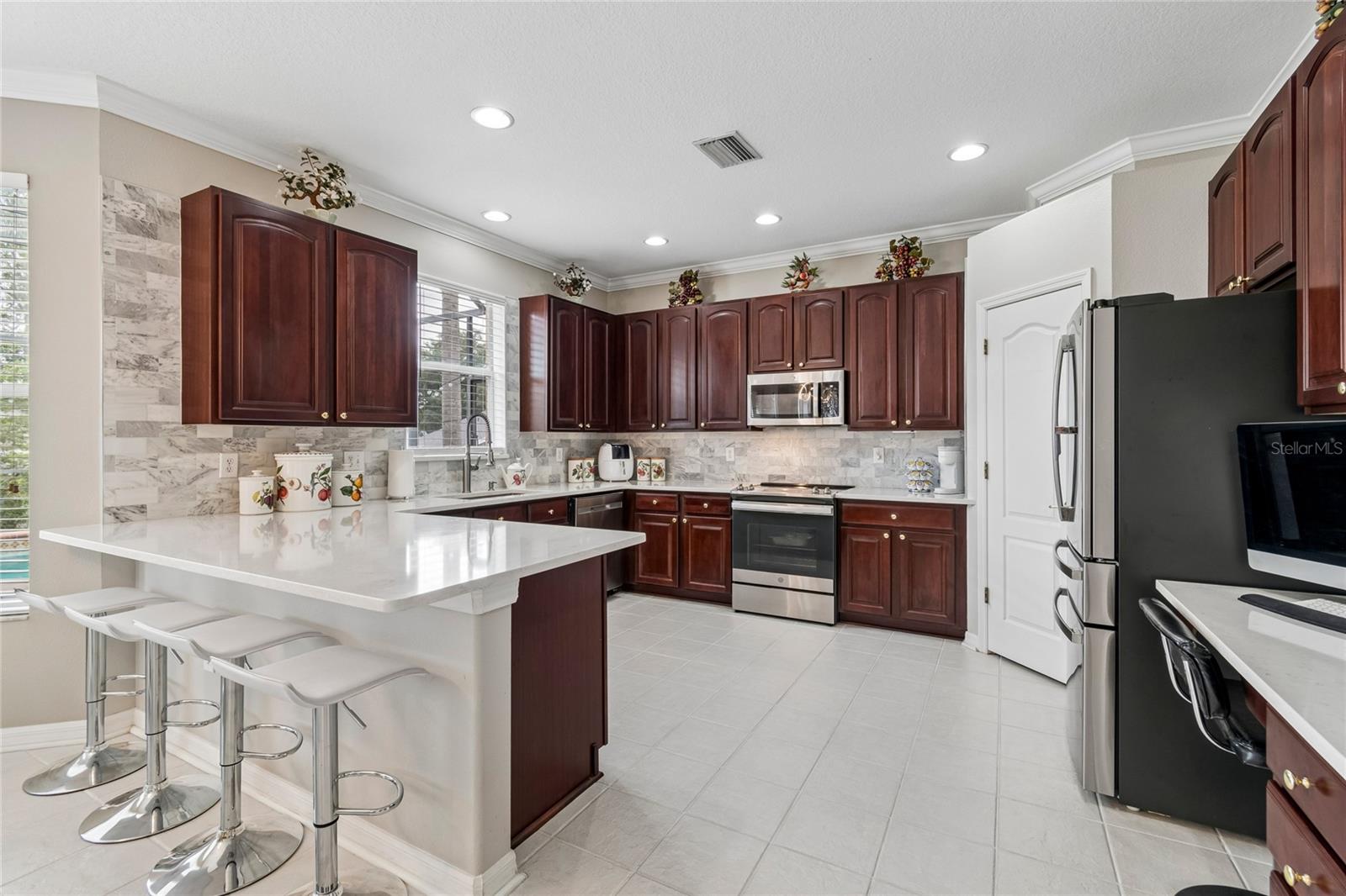 a large peninsula for casual dining or additional prep area