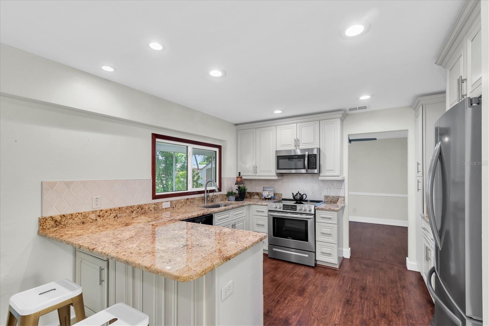 Breakfast bar seating perfect for casual dining and entertaining