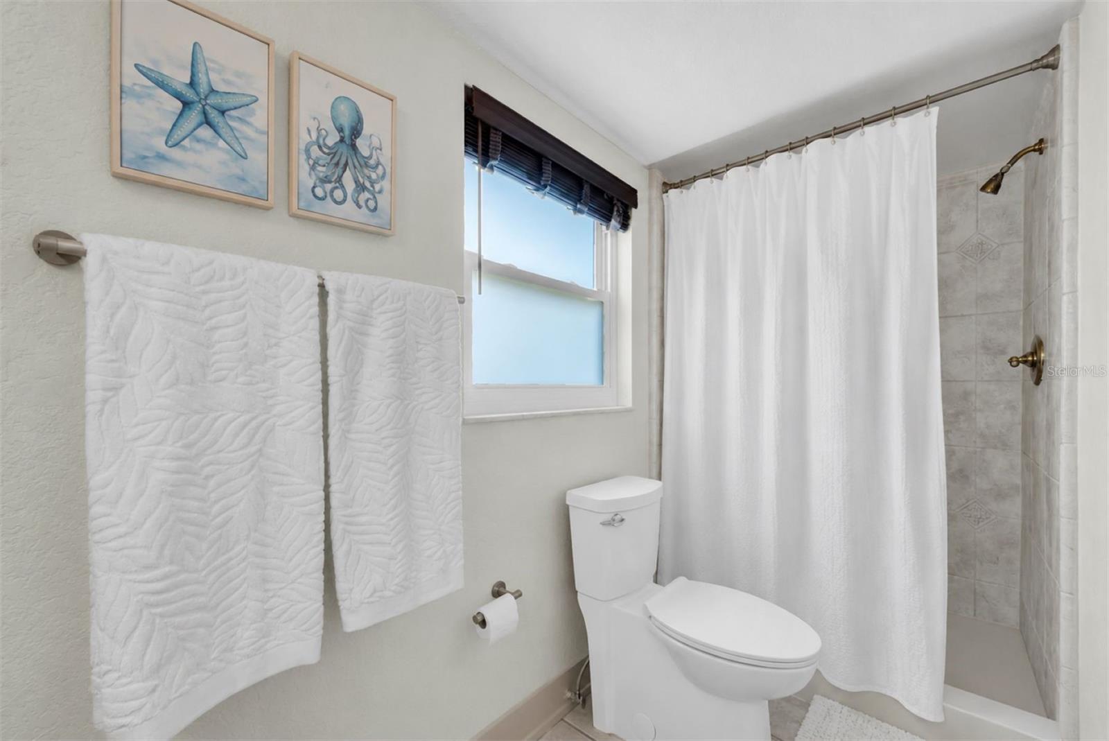 Hurricane-grade impact windows and doors throughout the home