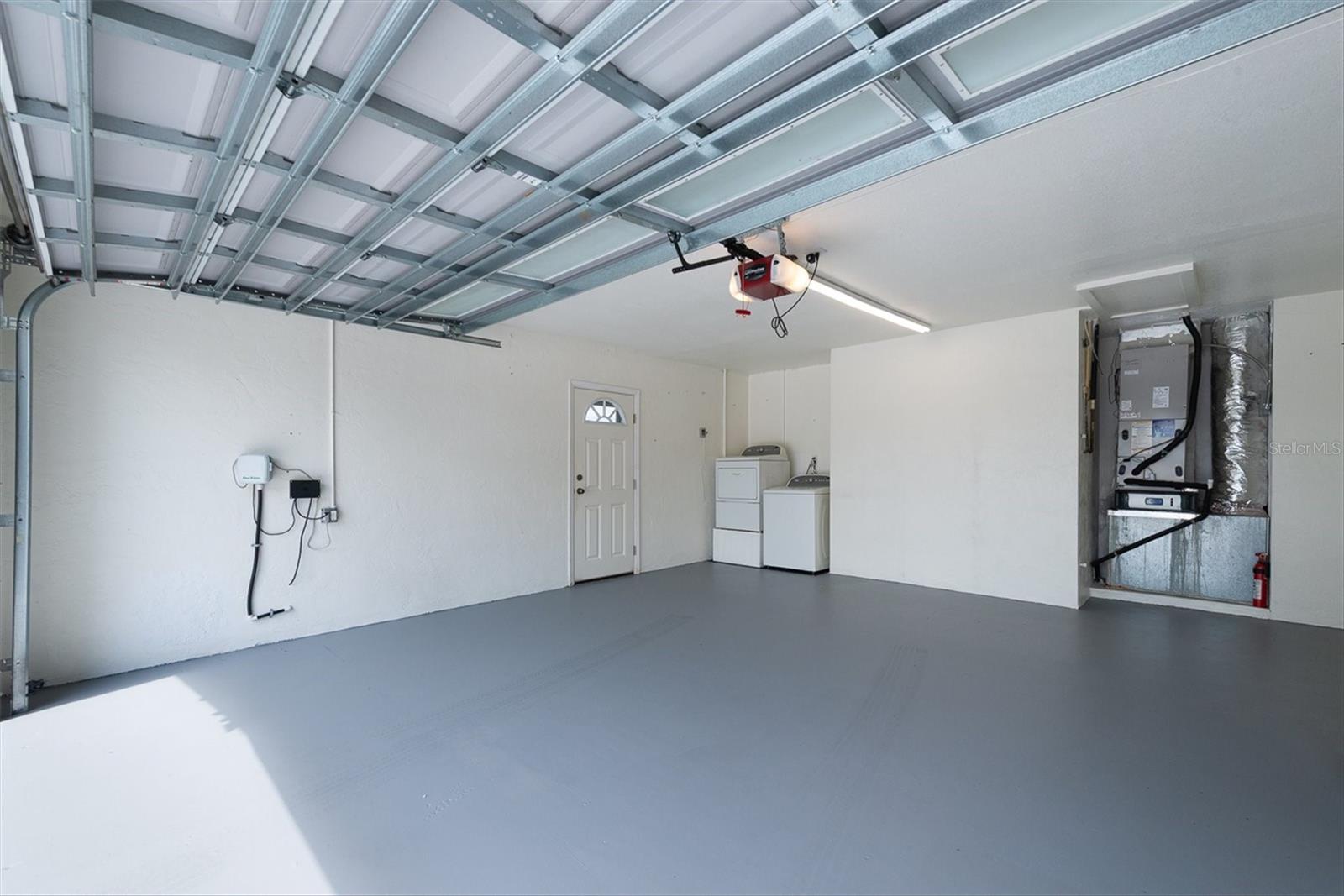 Convenient side-yard access for bikes, beach gear, or golf cart parking