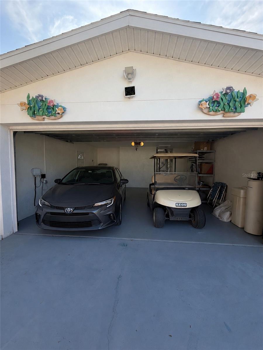 Spacious two-car garage with newer garage door and remote access