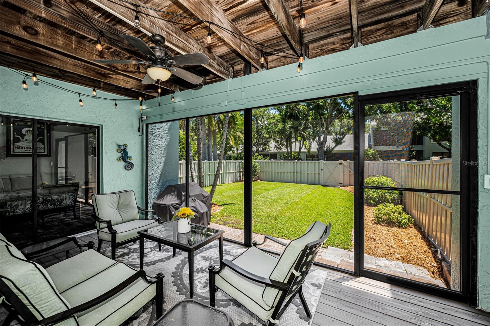 Enjoy Florida living at its finest from the oversized screened porch.