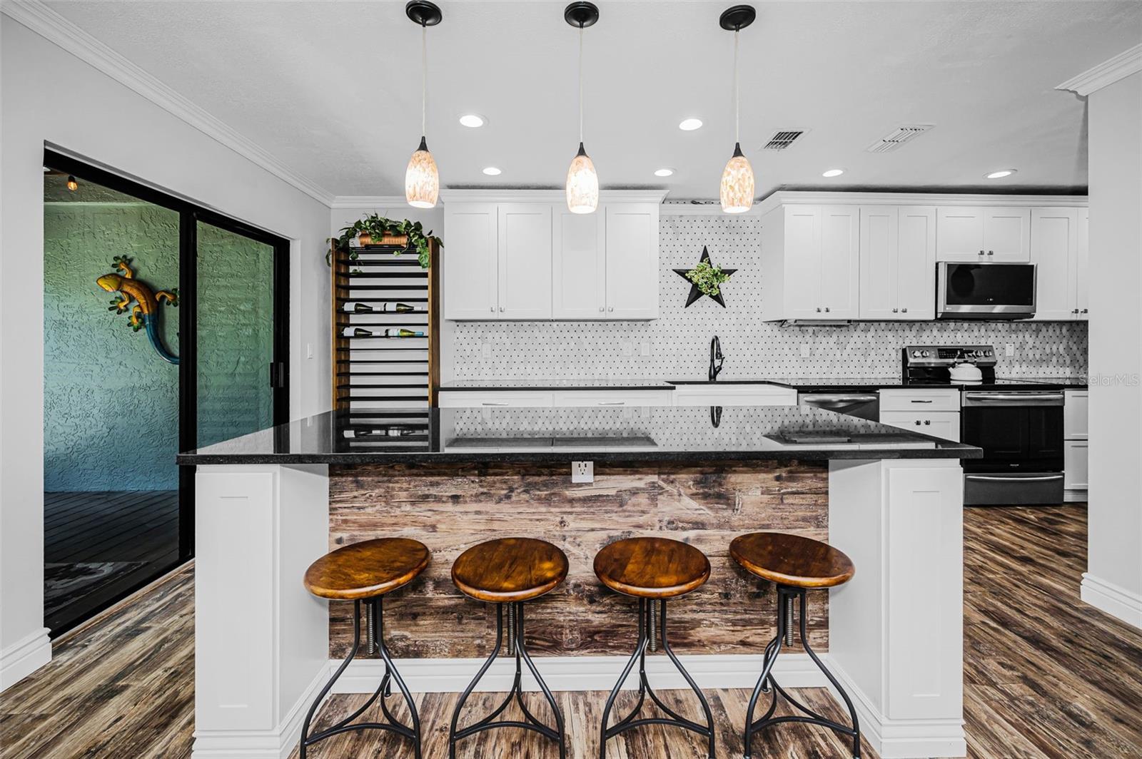 At the heart of the home, the stunning kitchen is thoughtfully designed for both everyday living and effortless entertaining.