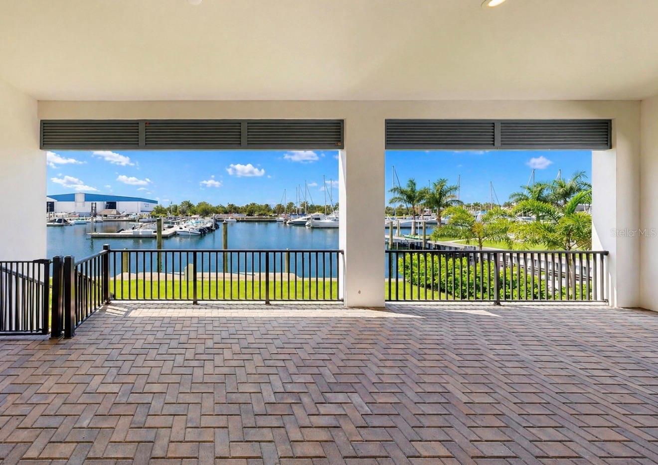 Back downstairs lanai overlooking marina