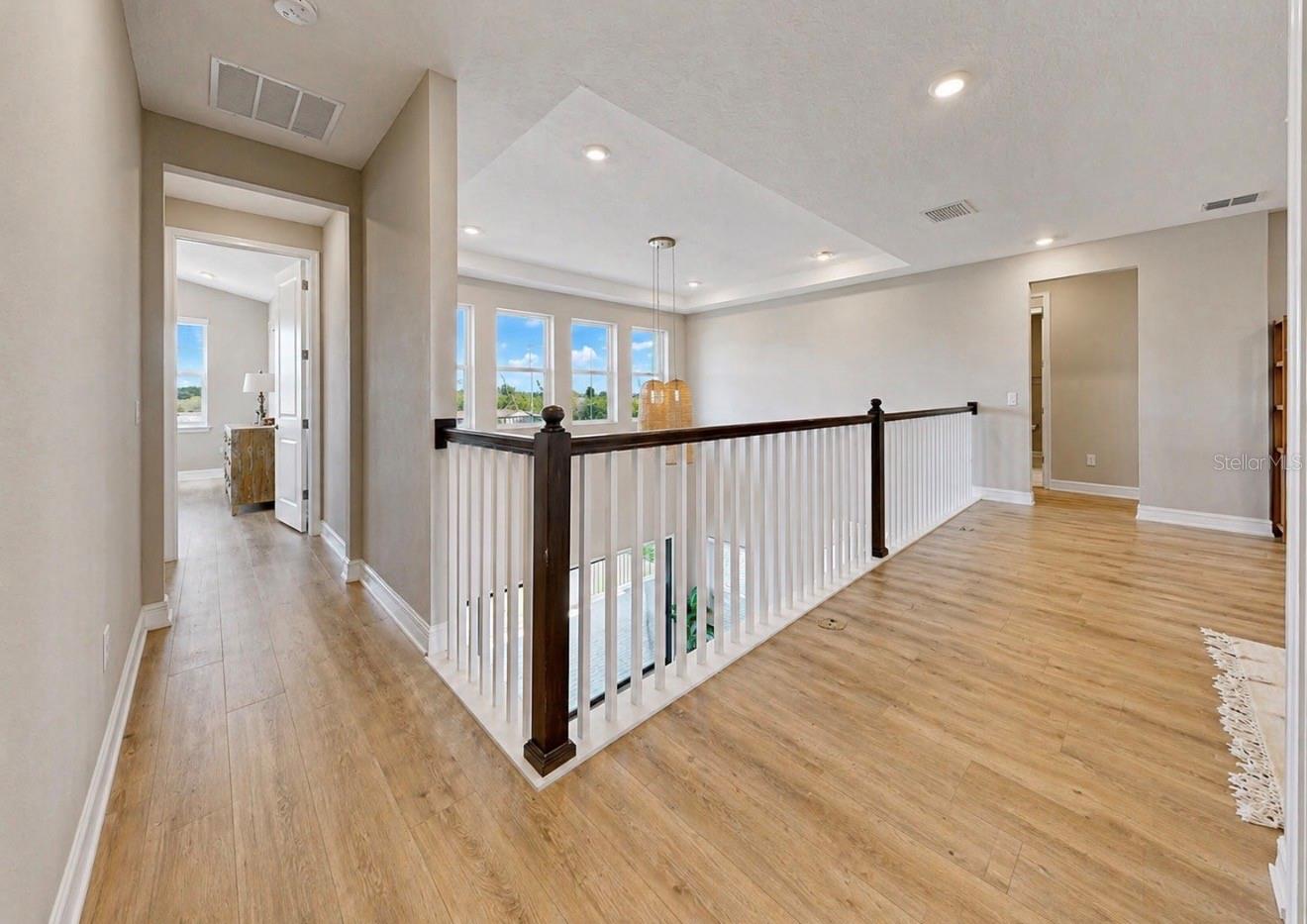 Upstairs hallway leading to primary