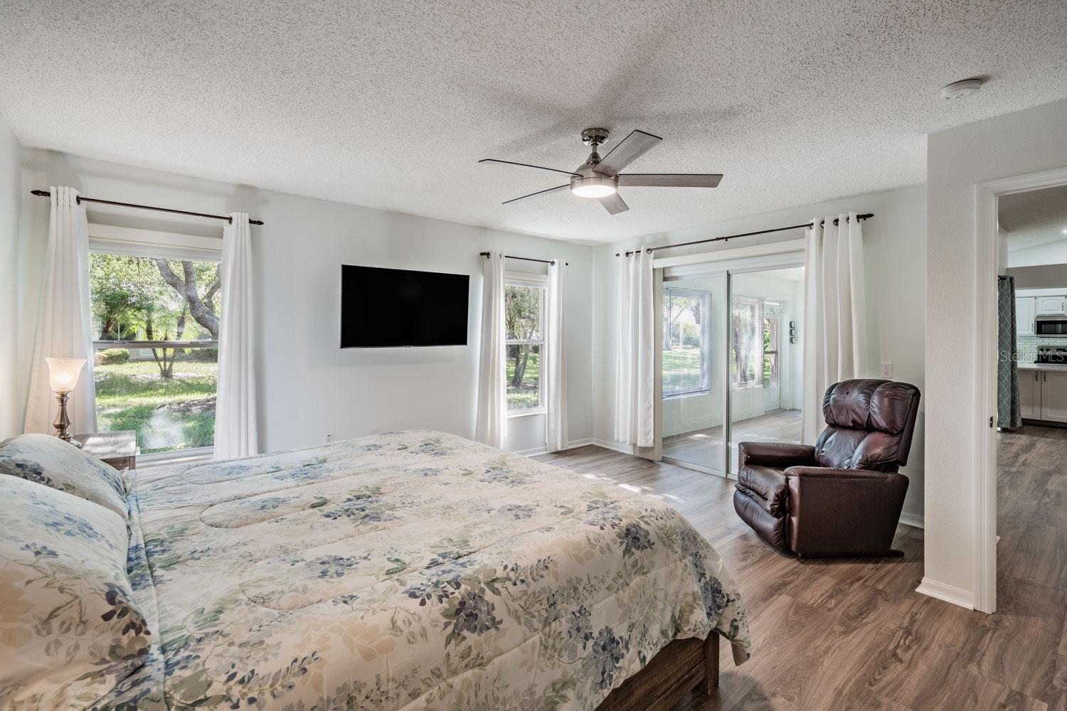Primary bedroom with direct Florida room access